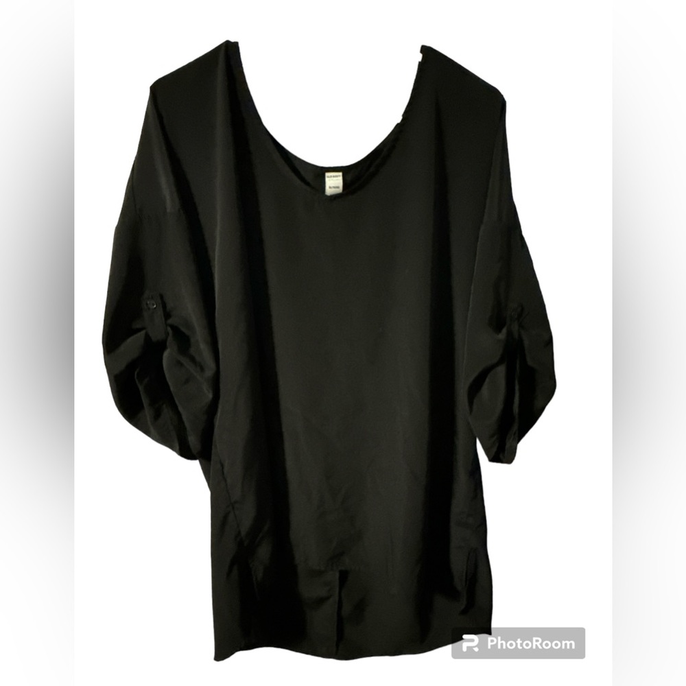 Black super cute XL shirt. I would not sell if I could fit it, but lost weight.